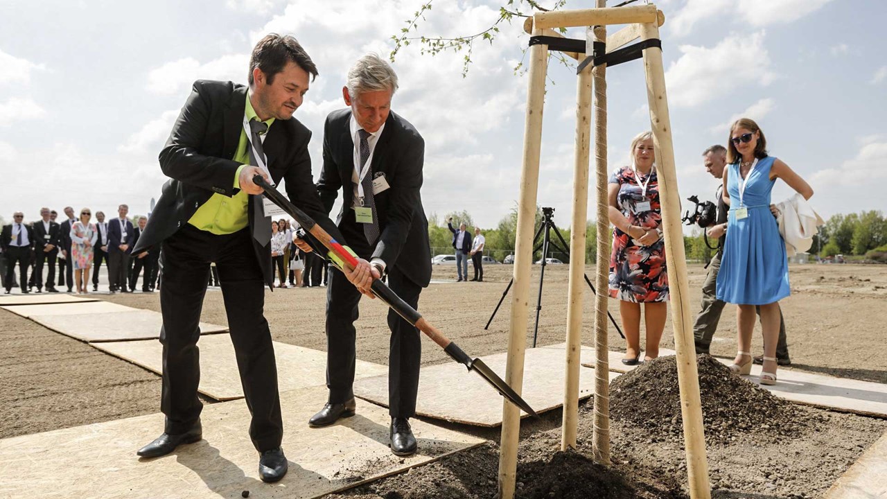 Emmanuel Chilaud, Gunnar Brock and Viktoria Li planting a birch tree in Havířov